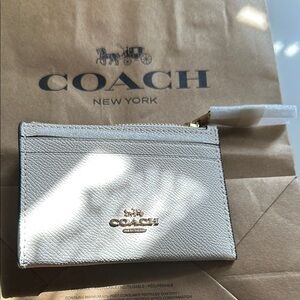 NEW Coach cream White Card Holder, 4.25 “wide, 3” tall. Never used